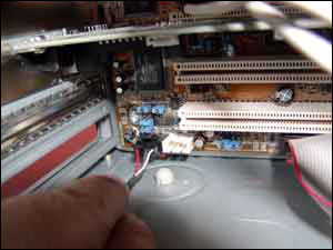 Attach the motherboard end of the audio cable