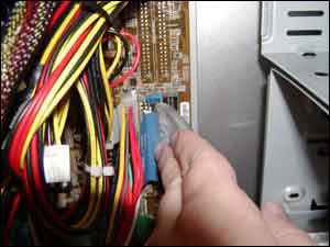 Attach the motherboard end of the IDE cable
